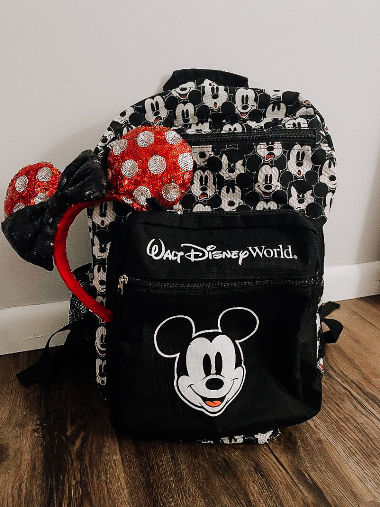 Mickey disney park bag with red polka dot Minnie Mouse ears